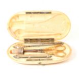 Ivory cased French gilt metal etui set