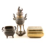 A Chinese bronze tripod censer, cast decoration, a small bronze censer, and a brass cricket box