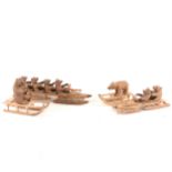 Four Arosa Black Forest type wooden models, comprising two bobsleigh's and two sledge