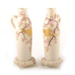 A pair of Royal Worcester ornamental ewers, 1873-74, ...