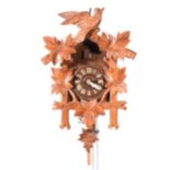 Beech cased cuckoo clock,