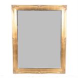 A modern gilt framed wall mirror, rectangular bevelled plate, 100cm x 142cm.