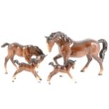 Four Beswick horses and foals