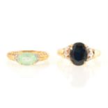 Two gemset dress rings, to include sapphire and tourmaline.