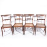 A set of four William IV mahogany dining chairs,