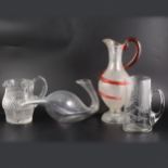 Frosted glass ewer with coiled serpent handle, collection of glass jugs, decanters etc.