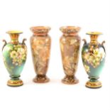 Two pairs of Doulton Faience ware vases, damaged