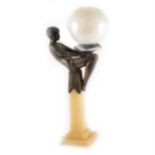 After Max le Verrier, an Art Deco style onyx and spelter lamp