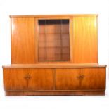 A Continental bleached walnut side cabinet,