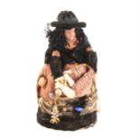 A pin cushion costume doll, designed as a Gypsy
