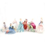 Eight Royal Doulton figurines, and a Coalport figurine