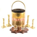 A quantity of decorative brass and copper ware including a warming pan, powder flasks.