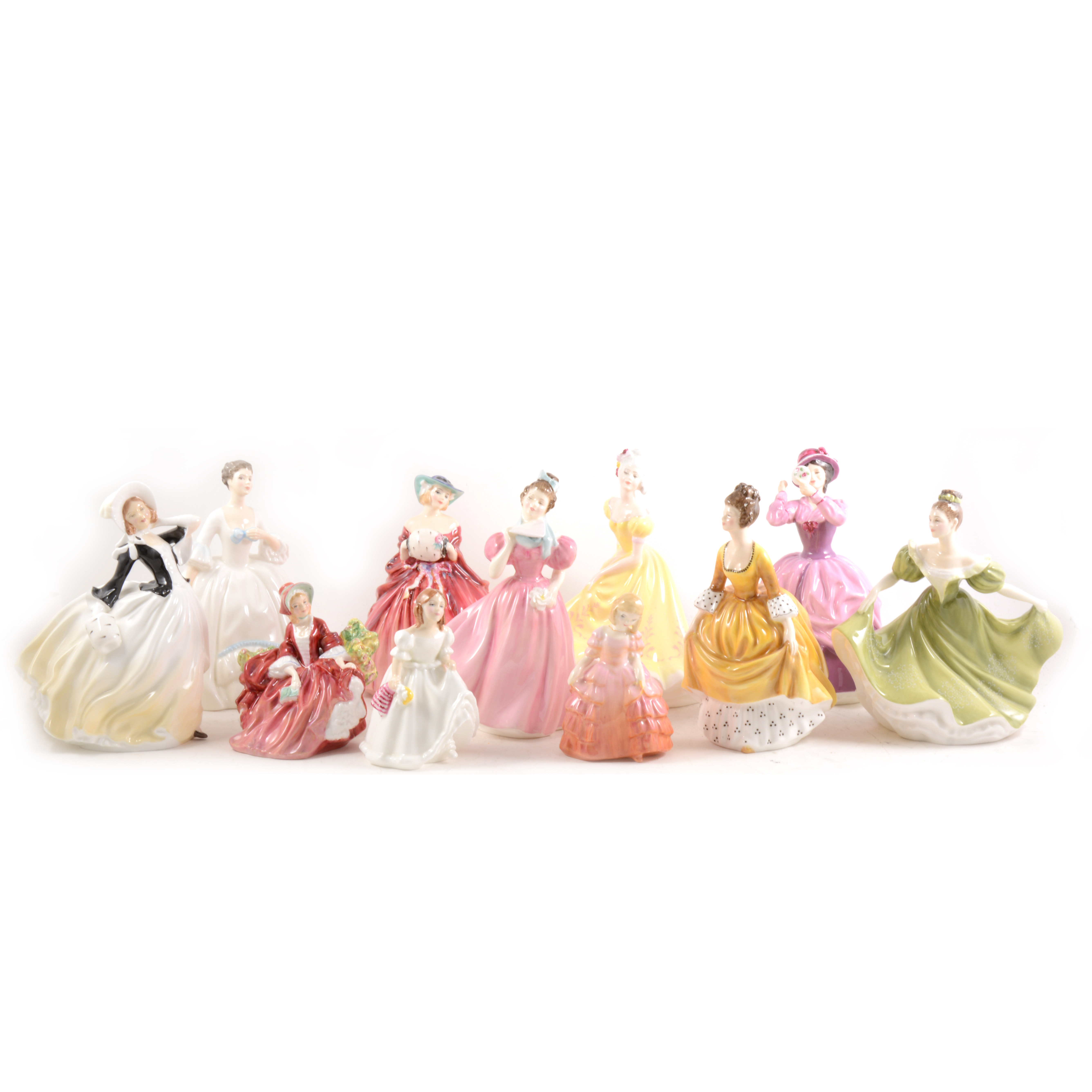 Eleven Royal Doulton lady figurines.