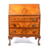 A walnut bureau,