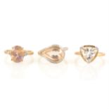 Three gemset dress rings.