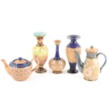 Seven items of Doulton Slater's Patent stoneware, including vases, teapots, and a bowl