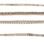 A collection of silver albert watch chains.