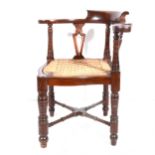 A Victorian walnut corner chair,