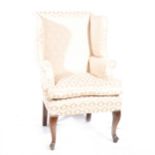 A wing-back lady's chair,