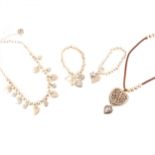 A collection often ten Bibi Bijoux white metal necklaces and bracelets in pouches.