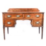 An Edwardian mahogany writing table