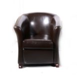 A contemporary brown leather tub chair, width 73cm.