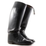 A pair of lady's black leather riding boots, size 7.