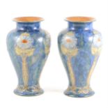 A pair of Doulton Lambeth stoneware vases