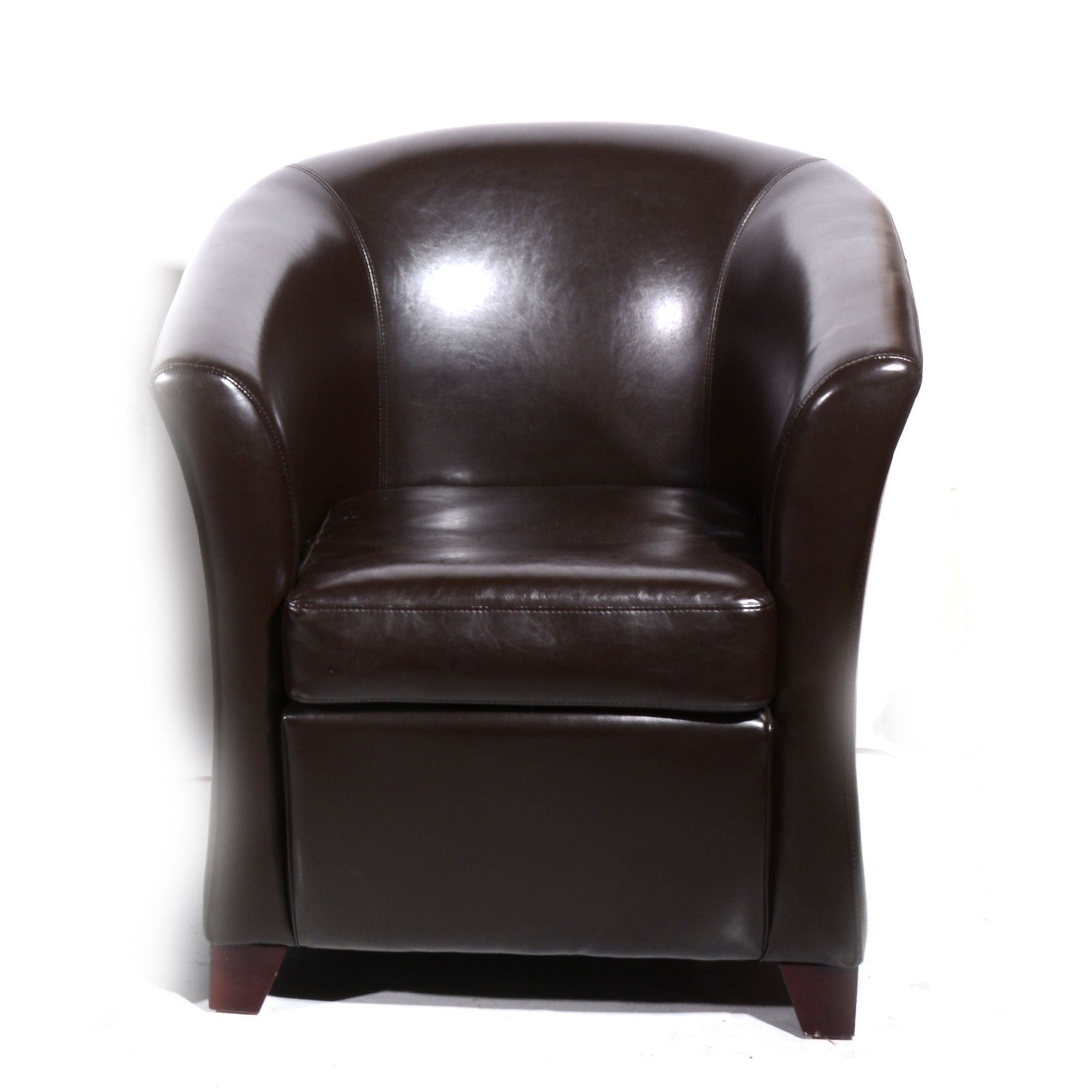 A contemporary brown leather tub chair
