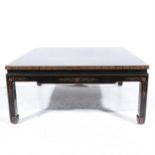 A Far Eastern black lacquered coffee table