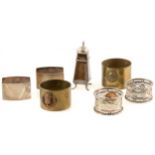 Two pairs of silver napkin rings , a mustard pot, two military metal napkin rings.