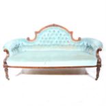 A Victorian walnut sofa,