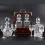 Modern two bottle tantalus with Stuart Crystal decanters, and a small quantity of cut-glass