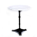 A cast iron pub table, circular marble top, tri-form base, diameter 61cm.