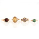 Four vintage stone set dress rings.