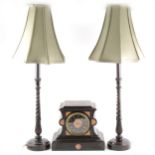 French black marble and inlaid mantel clock, and pair of wooden table lamps