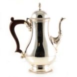 A silver Queen Anne style coffee pot by Barker Ellis Silver Co.
