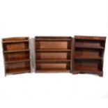 An oak four heights open bookcase, width 64cm;