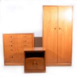 A three-piece teak finish bedroom suite, labelled Merrydew Avalon,