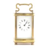 French brass carriage clock, serpentine case