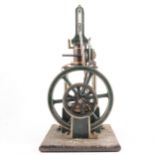 A well engineered single cylinder vertical beam engine; live steam model with 7inch fly wheel