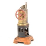 A German made vertical single cylinder live steam stationary engine, with burner, (no chimney),