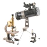 A Danubia Dorr table-top telescope and two microscopes.