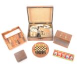 A modern chess set; folding rulers, etc