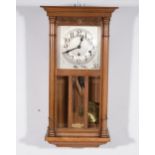 A light oak wall clock
