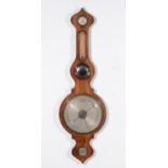 A Victorian rosewood banjo shaped wall barometer