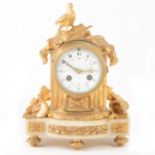 A Louis XVI style gilt metal and alabaster mantel clock, 19th century