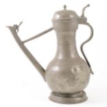 A Swiss pewter wine flagon, bears date 1797