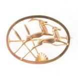 Geoffrey Bellamy for Ivan Tarratt a 9 carat yellow gold leaping gazelle brooch.