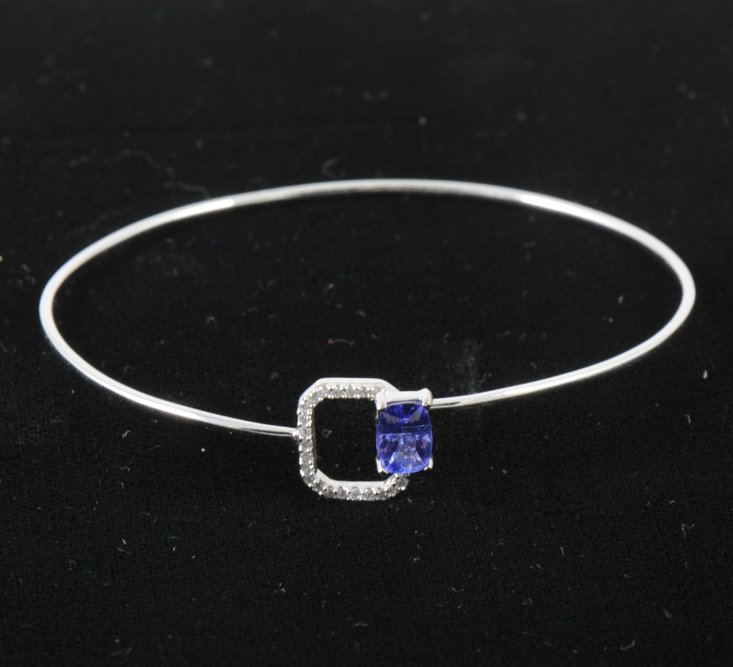 A delicate tanzanite and diamond bangle.